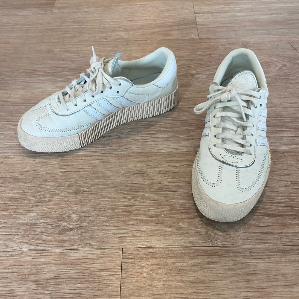 Cream and white adidas sambarose